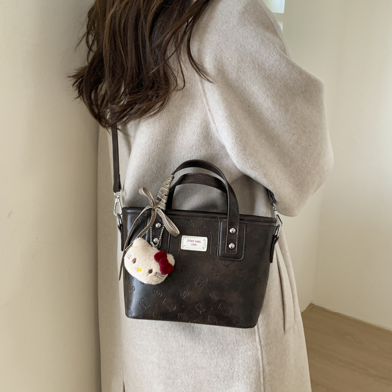 Bolso de mujer 2025 nuevo nicho de textura de alta calidad otoño invierno retro versátil bolso de mochila bolso de cubo de mano