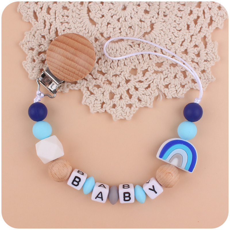 Bebé suministros de dibujos animados silicona arco iris chupete cadena creativa silicona mordedura cola molar cadena anti-gota cadena