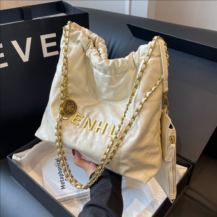 Bolsas de basura transfronterizas pequeñas bolsas de cubo de cadena de viento fragante para mujeres otoño y invierno 2025 nueva textura mochila de hombro de moda mochila