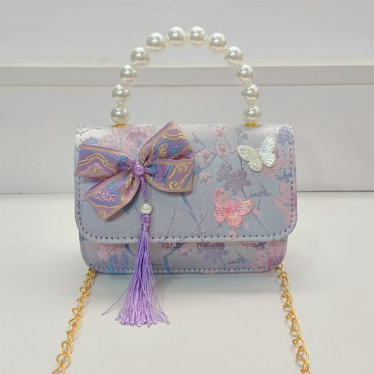 Bolsa de arco de estilo nacional de la princesa bolso de perla bolso de cadena bolso cuadrado bolso accesorios de ropa china para niños regalos de vacaciones de niñas