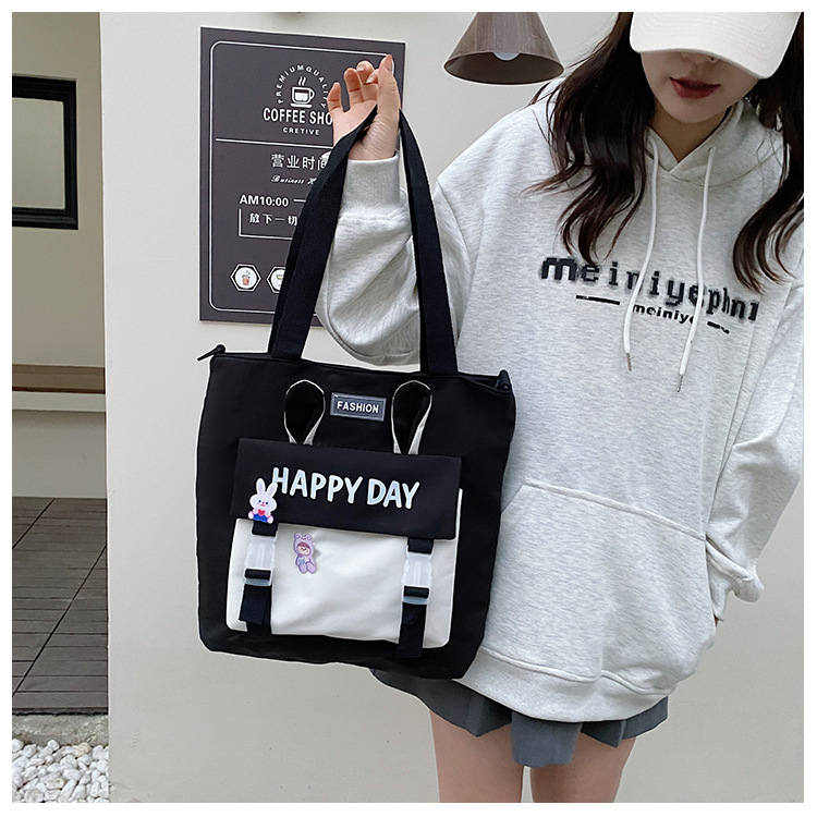 Large-capacity file bag, primary school student handbag that can be carried on one shoulder, book bag for girls with high appearance standards, homework books and test papers bag undefined