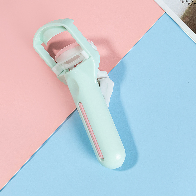 En stock fábrica al por mayor de plástico rizador de pestañas rizador de conformación portátil almohadilla de goma principiante prensa-tipo rizador de pestañas