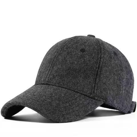 Hombres y mujeres de invierno nuevo estilo coreano de lana negra caliente estilo casual gorra de lengua gorra de béisbol gruesa