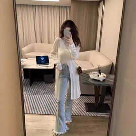 女式秋季新款白色羊毛针织衫性感镂空长款外套毛衣开叉设计防晒衫