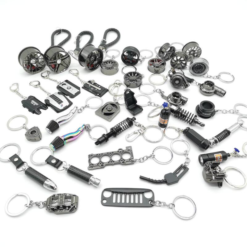 Black car parts full series wheel hub turbine cover shift head seat brake disc keychain pendant in stock Black car parts full series wheel hub turbine cover shift head seat brake disc keychain pendant in stock