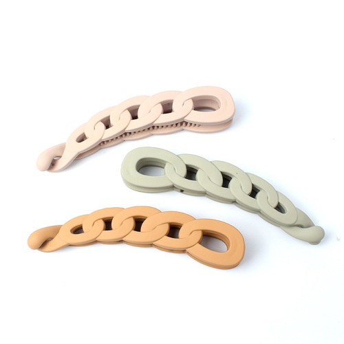 Korean style vertical banana clip, simple and fashionable commuter frosted hollow design twist clip, versatile ponytail clip for the back of the head