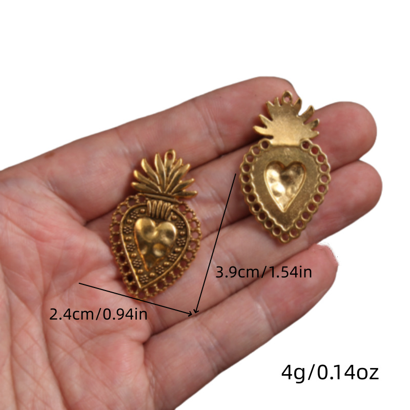 Transfronterizos 10 estilos de oro antiguo colorado colgante de aleación del corazón sagrado DIY encanto joyería accesorios metálicos