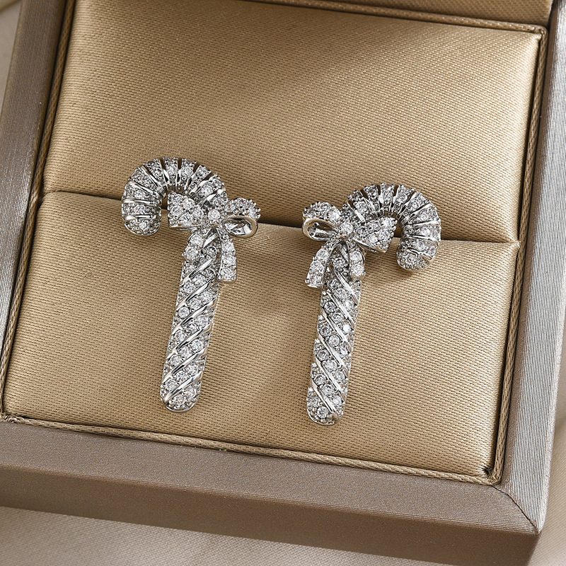 S925 Silber Nadel Japanische und Koreanische Mode Ohrringe Kupfer Micro intarsien Zirkon Fee Stick Schmetterling Knoten Ohrringe Einfache und Vielseitige Ohrringe f_voghion.com