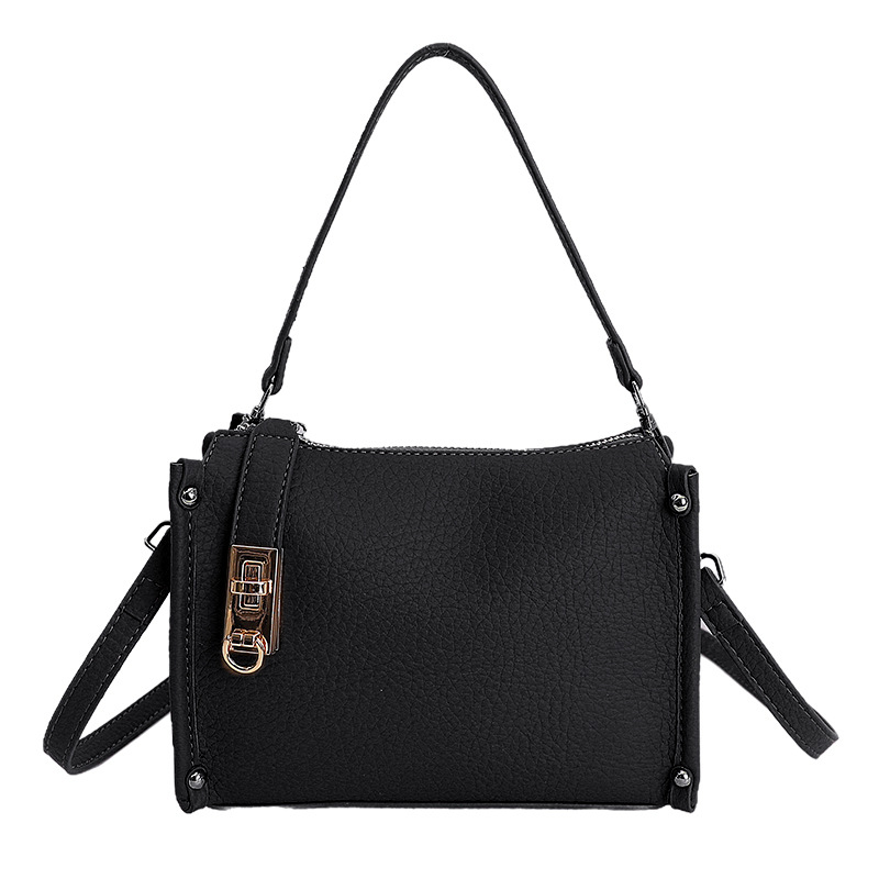 Nicho Zhong textura bolso de mujer 2026 nuevo remaches de gran capacidad simple de hombro simple bolso de brazo de viaje