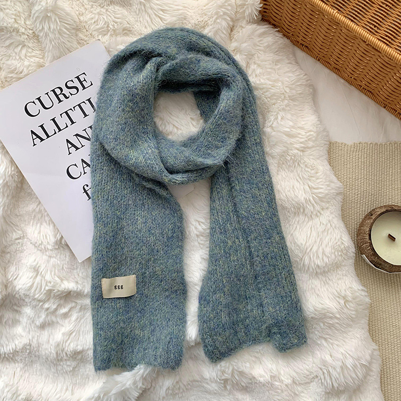 Bufandas de invierno femeninas de alta calidad 2025 nuevo color sólido calentamiento imitación de cachemira collar bufandas de punto al por mayor