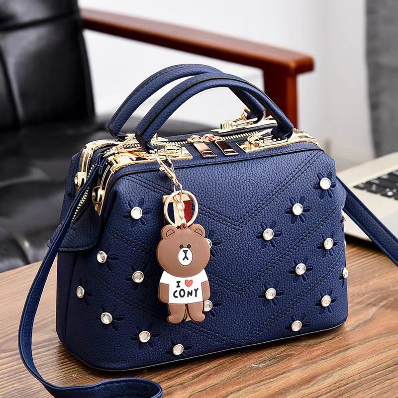 Bolsa de hombro lisa de estilo de moda de mujeres bolsas de comercio exterior de mujeres 2025 nuevo bolso de mano texturas coreanas