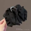 Black crab pin with bow, 13cm
