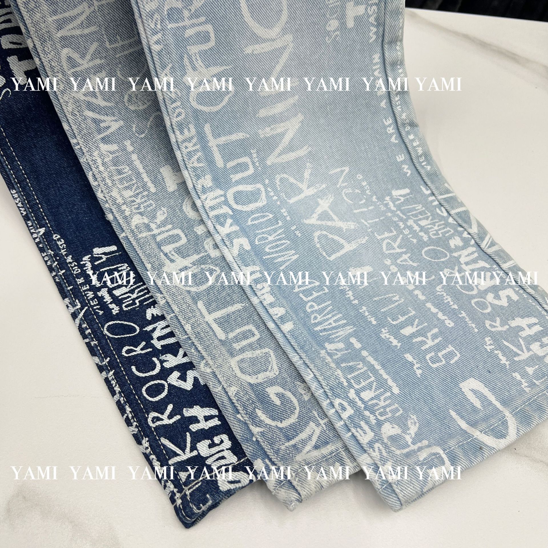 Fábrica de mezclilla al por mayor 7*7 Algodón Shandong Denim izquierda sarga no elástico Inglés carta de mezclilla de tela impresa image 4