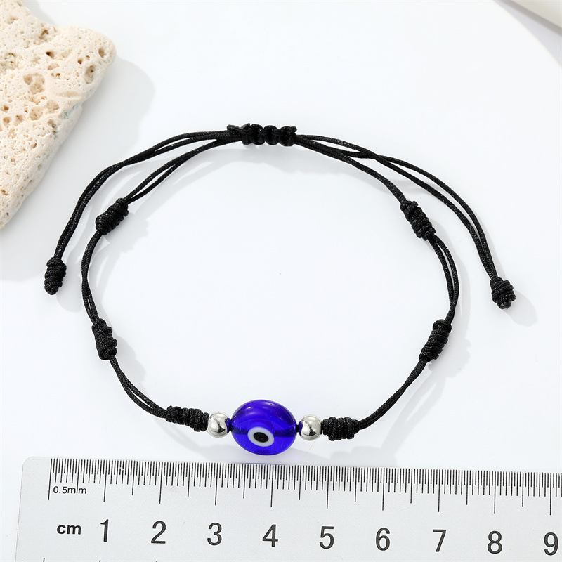 Europe And America Cross Border Ornament Retro Simple Blue Devil's Eye Black Rope Bracelet Hand-woven Drawstring Bracelet display picture 1