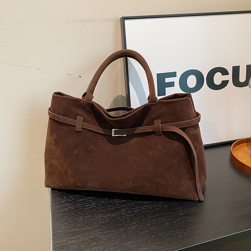 Nišidisain 2024 sügis ja talv uus härmas seemisnahast vööpandlaga käeshoitav kandekott laisa stiiliga pendeldaja naistele_voghion.com