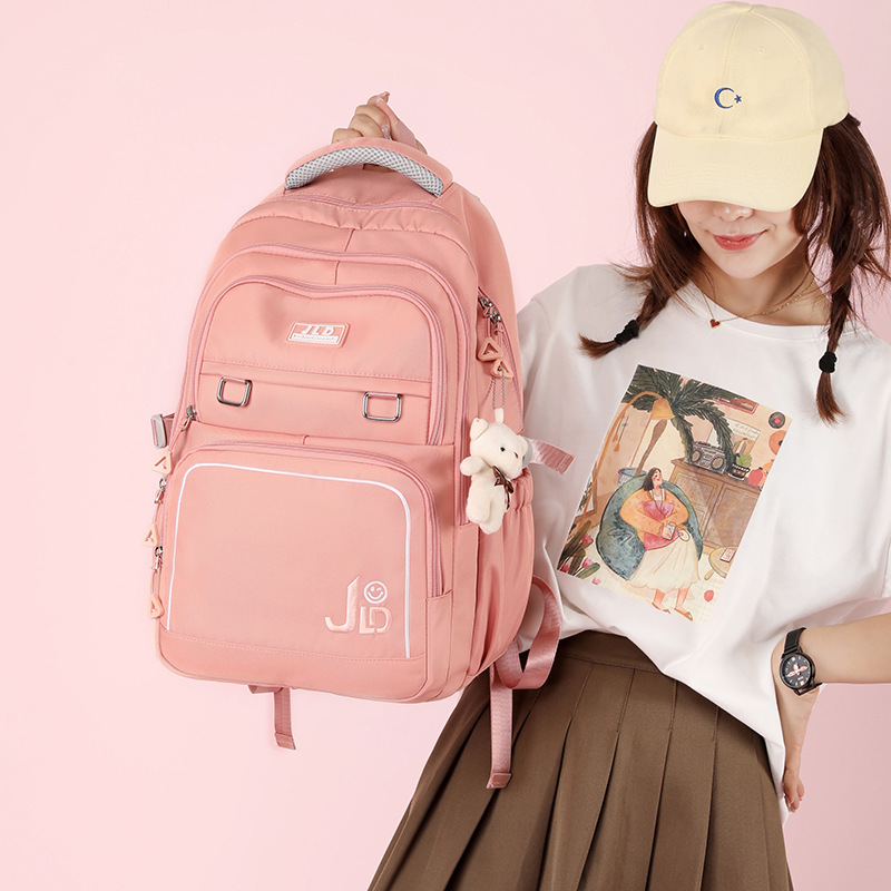 Ultra-ligero de gran capacidad junior high school student schoolbag estudiante universitario viaje mochila impermeable estudiante de secundaria de alto aspecto chica mochila
