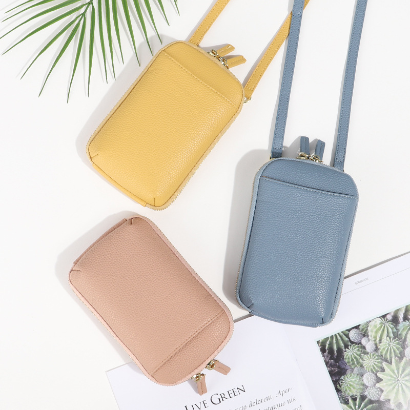 Guangzhou nuevo simple crossbody bolso del teléfono móvil de las mujeres de moda bolso de hombro ligero versátil vertical león cresta pequeña bolsa de fábrica