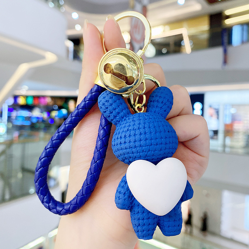 Resina creativa melocotón corazón tejido amor conejo llavero al por mayor ins pareja escuela coche llavero colgante