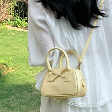 2025春夏季新款单肩斜挎包女青春可爱蝴蝶结小手提包手拎保龄球包