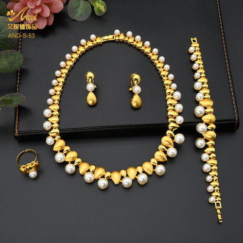 Set of Four Women's Wedding Jewelry for Dubai: Diamond, Pearl Necklace, Ring, Earrings, and Bracelet for Formal Occasions