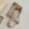 Tights with bow, with embroidery