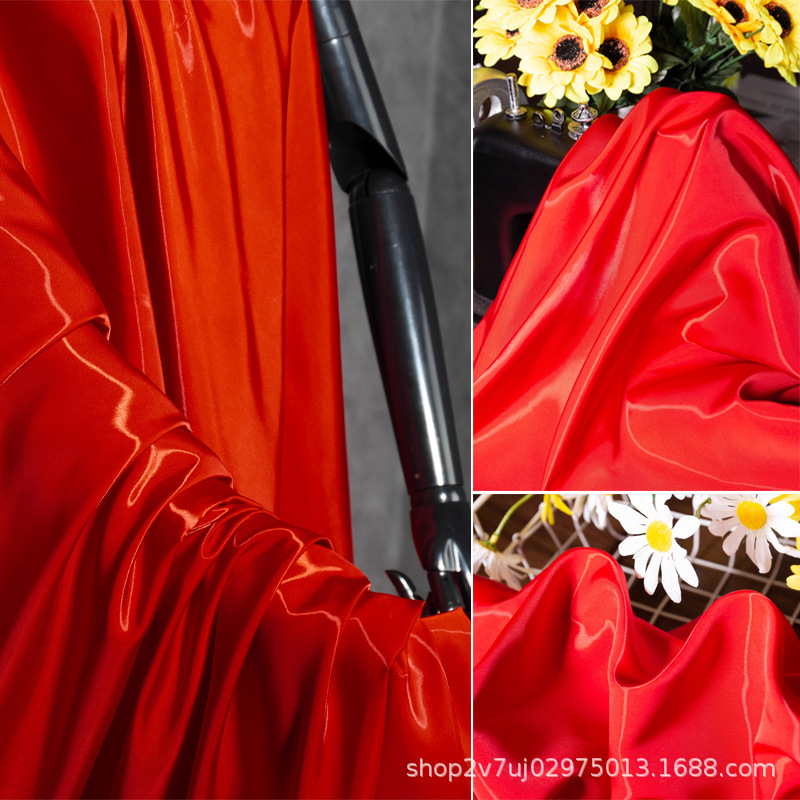 大红色正红色超亮光感水晶丝缎时装面料加密水光风衣裙子外套布料