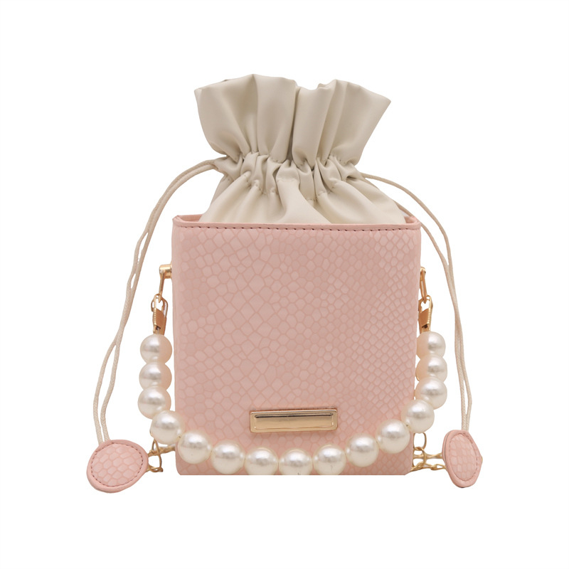 Mini bolso de cubo hermoso bolso con cordón de perlas de aire occidental para mujer 2025 nuevo bolso de mensajero de un solo hombro con cadena portátil