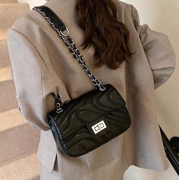 Bolsos de cadena de moda de comercio exterior para mujer 2025 nuevo bolso de hombro con textura de todo fósforo de alta calidad