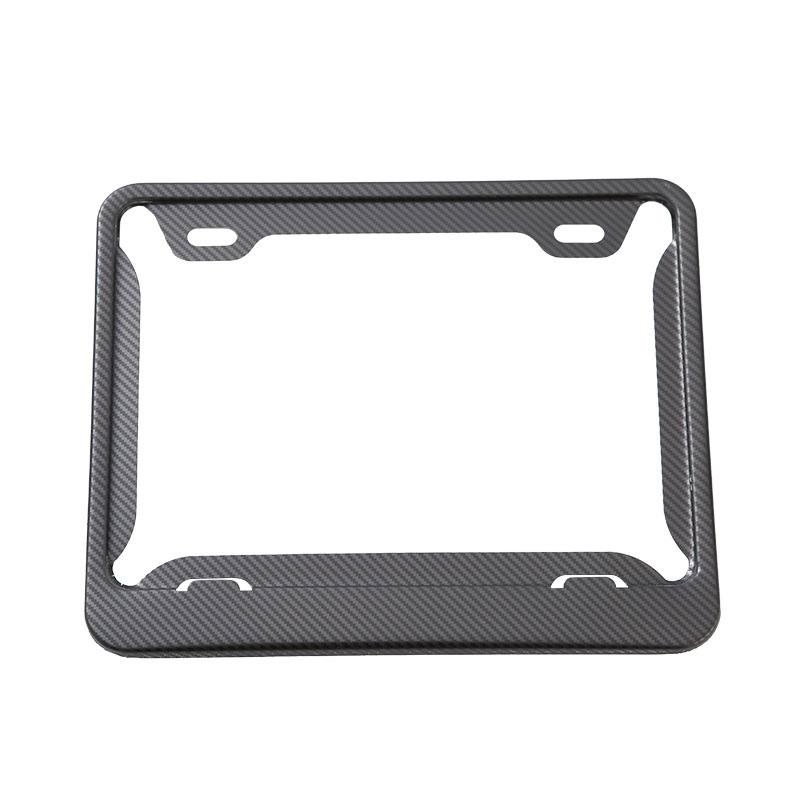 El fabricante suministra el marco estándar americano de la placa de matrícula de fibra de carbono de acero inoxidable cubierta protectora transfronteriza antirrobo multifuncional marco de la placa