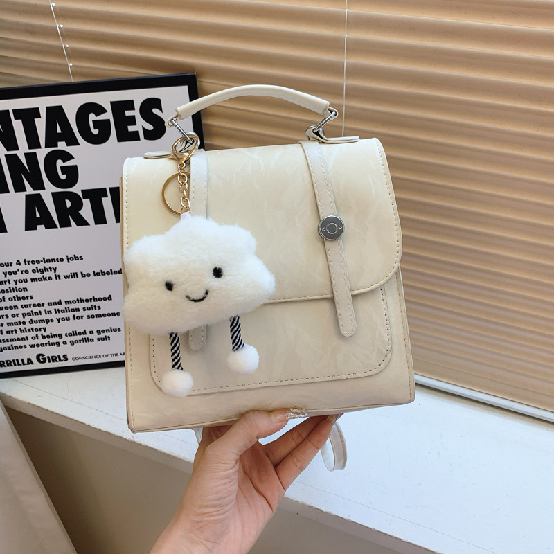 Mochila pequeña 2024 nuevo estilo de diseño de moda nicho de viaje bolsas escolares ligeras para mujeres ins para salir mochila pequeña