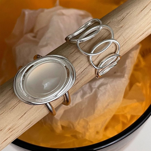 Korean style ring female personality niche egg white stone pigeon egg ring cold style simple versatile hollow line ring