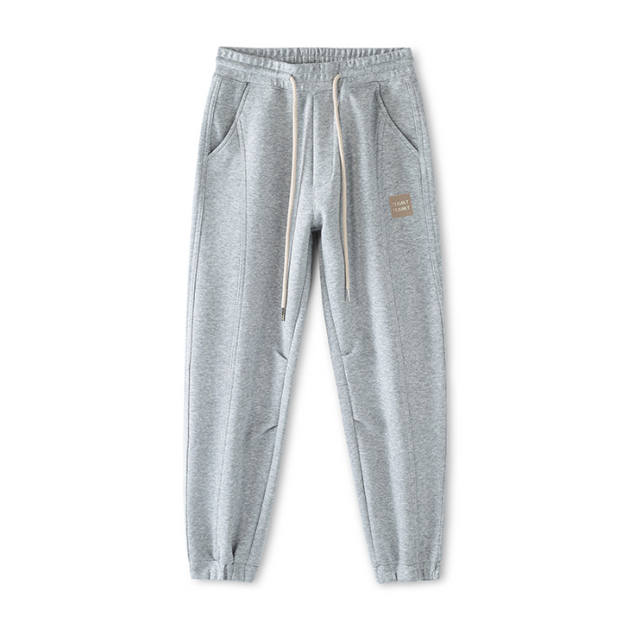 Mick Jones2025 caño hombre pantalones casuales sueltos versátiles estilo coreano de moda pantalones deportivos gris regular
