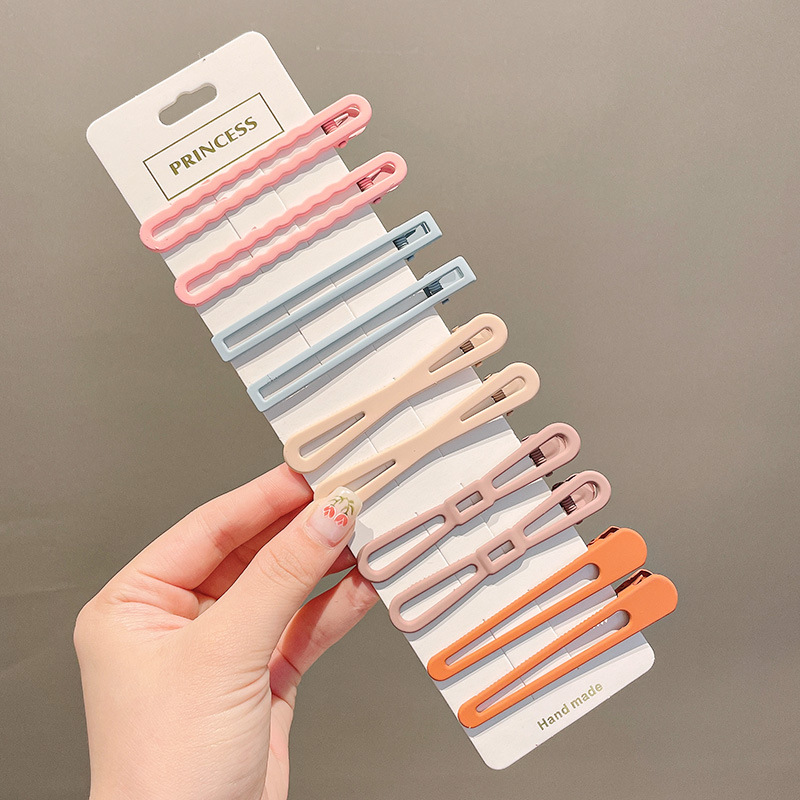 Clip de flequillo lateral rojo de la red femenina 2025 nueva horquilla simple clip de una línea horquilla clip de cabello roto tocado clip de pico de pato