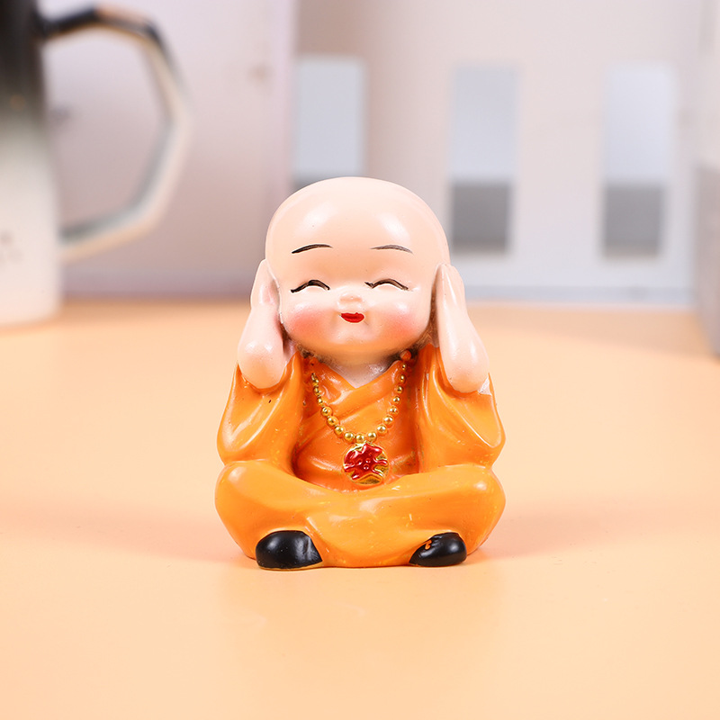 Adornos para coche: cuatro pequeños monjes, niños de kung fu de Shaolin, figuras creativas y únicas de resina para decoración de coches.