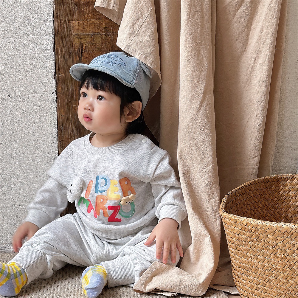 Ropa de salida para niños Ropa de primavera Ropa para niños coreanos Traje de primavera y otoño para bebés Suéter impreso para bebés Pantalones de dos piezas