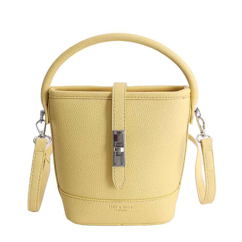 Litchi estampado bolso de cubo de mano mujer 2026 venta caliente nueva moda coreana alta textura mochila de hombro