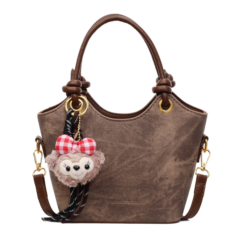 Bolsa de mano de alto nivel, bolso de cubo de moda, mujer, otoño y invierno, 2025, nuevo tipo de bolso de hombro casual, bolso de mochila universal.