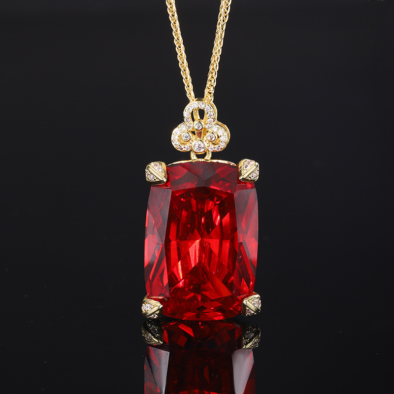 Colgante rojo naranja dorado con cadena Chopin