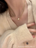 Yellow necklace from pearl, small design sweater, chain, light luxury style
