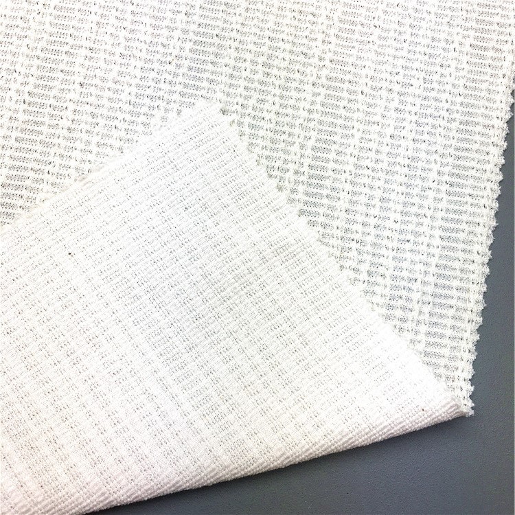 厂家供应粗针抽条泡花银线罗纹布针织女装不规则罗纹