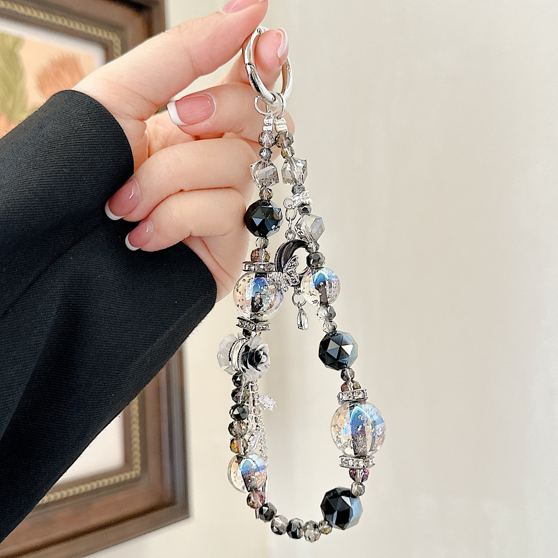 Cadena de teléfono móvil de alta gama hecha a mano de boutique, cadena de pulsera de luna de cielo estrellado, cordón de teléfono móvil de moda, mochila/colgante corto