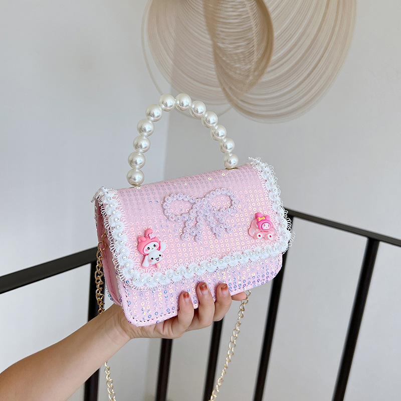 2025 nuevo lindo arco princesa bolsa de perlas portátil moda versátil mochila de hombro bolso de cambio coreano