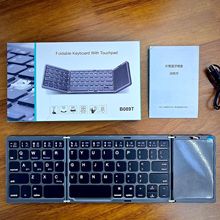 B089T三折叠无线蓝牙键盘 妙控带按压触摸板多系统手机平板电脑