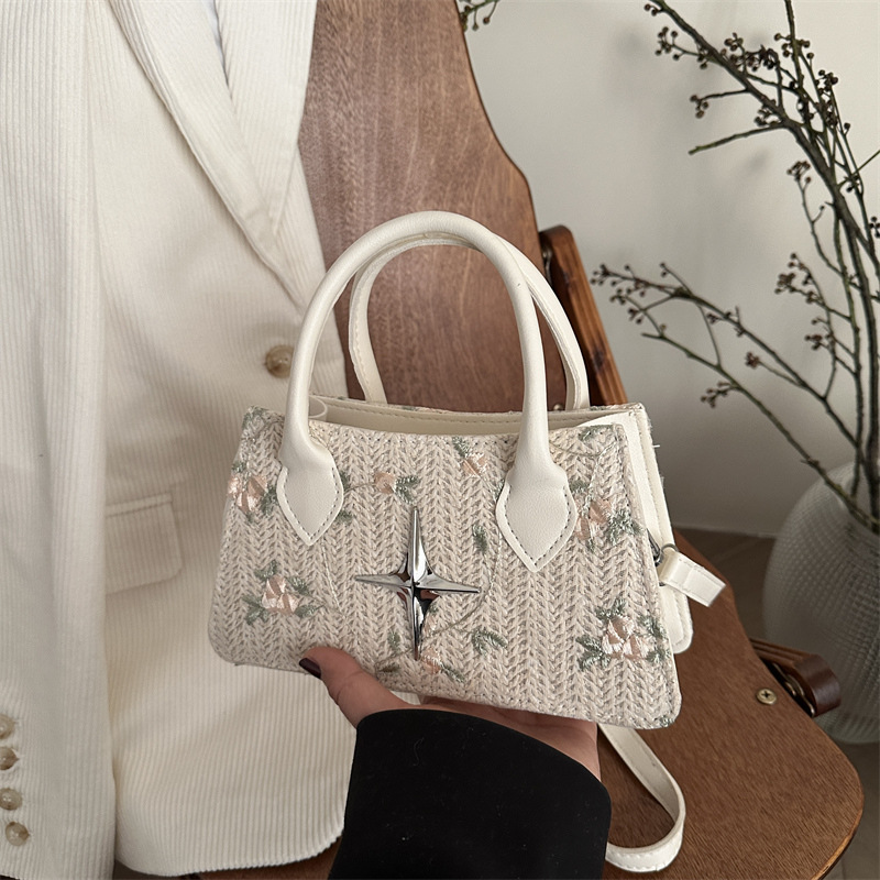 Bolsas de paja de moda populares bolsas de nicho 2025 nuevas bolsas de mujer flores bordadas bolsas de hombro dulces mochilas
