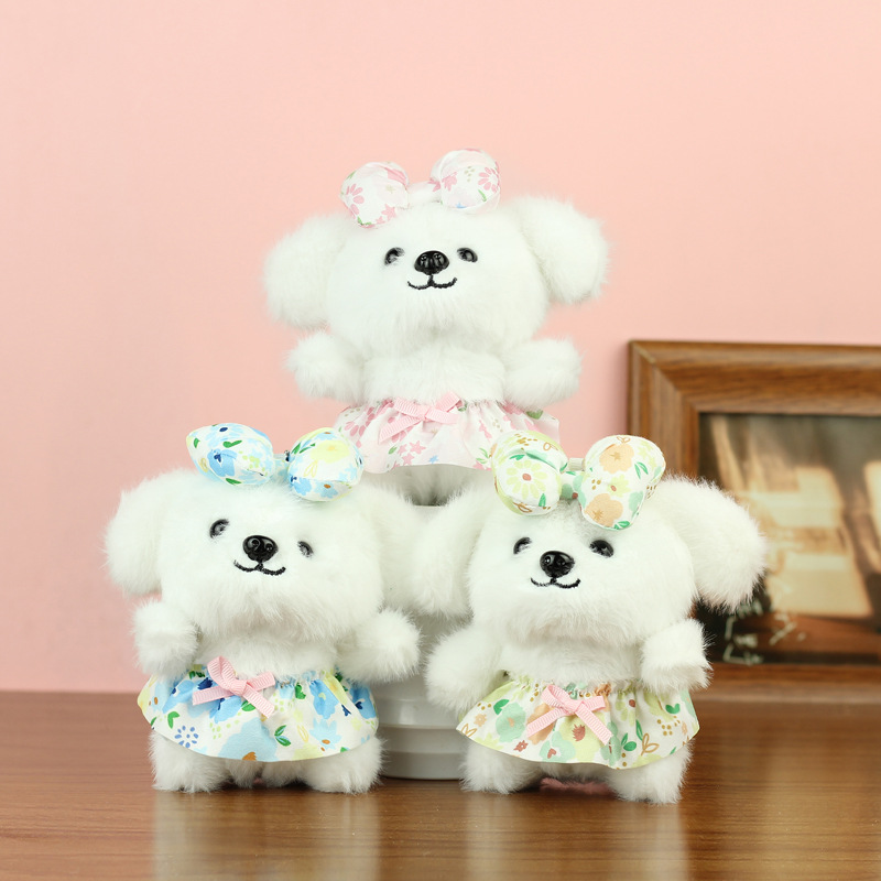 Linda y linda falda floral colgante de perro de juguete de peluche de dibujos animados muñeca de perro bolso de escuela colgante muñeca muñeca pequeña