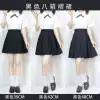 Black shirt, pleated skirt