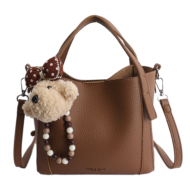 Nicho coreano litchi pattern bolso de cubo de mano mujer comercio exterior nueva moda alta textura ligera lujosa bolsa de mochila