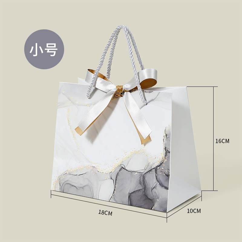 Bolsa de regalo de lujo ligera tienda de ropa bolsa bolsa de mano bolsa de compras bolsa de papel regalo bolsa de embalaje personalizada