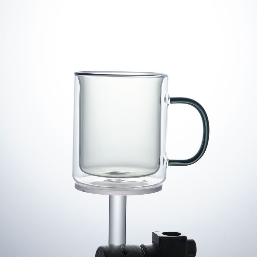 Vaso de vidrio de doble capa al por mayor para el hogar con asa Vaso de vidrio de borosilicato Taza de café simple Taza de color de desayuno