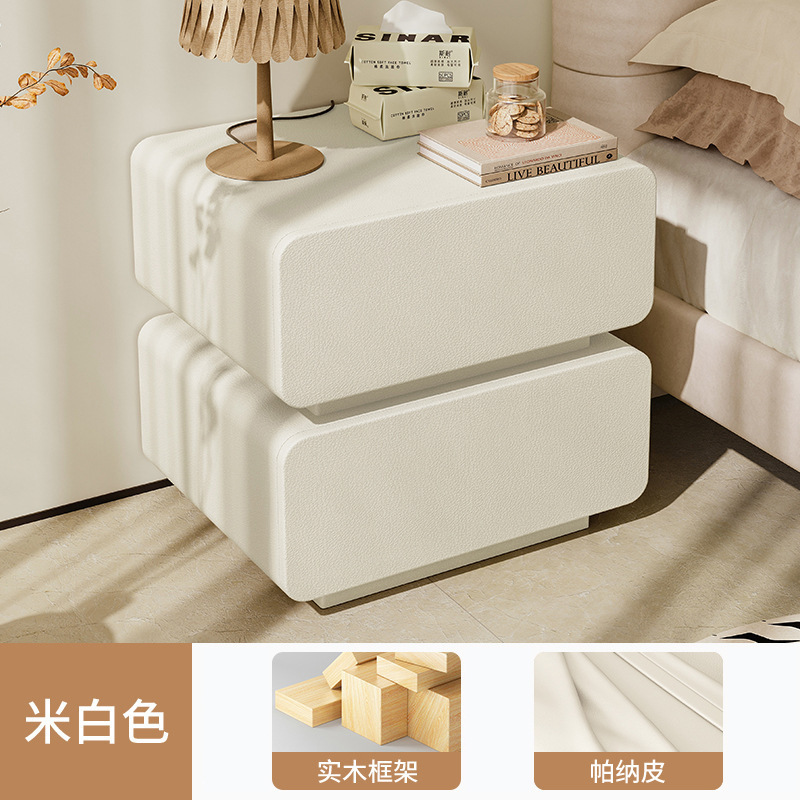 Mesita de noche, estilo crema, madera maciza, simple, blanco moderno, modelo de diseñador creativo, lujo ligero, dormitorio principal de alta gama, nuevo